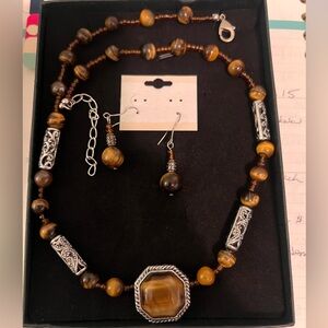 jewelry set made of glass includes earrings and necklace